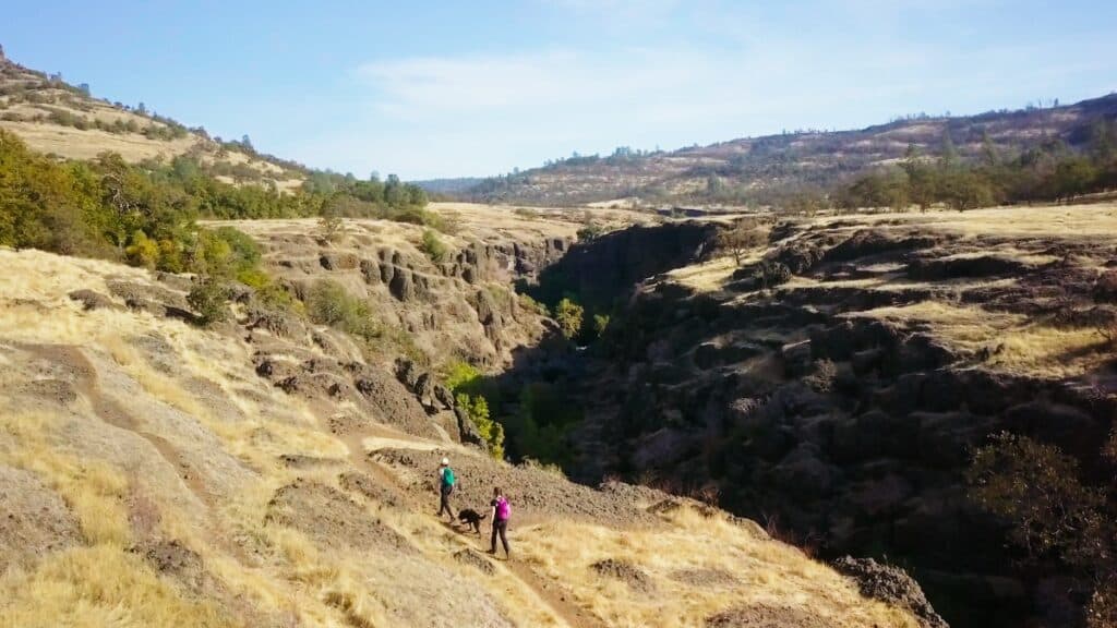 An aerial view of two women hiking a trail in Chico's Upper Bidwell Park