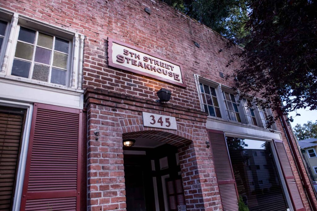 The brick exterior of 5th Street Steakhouse