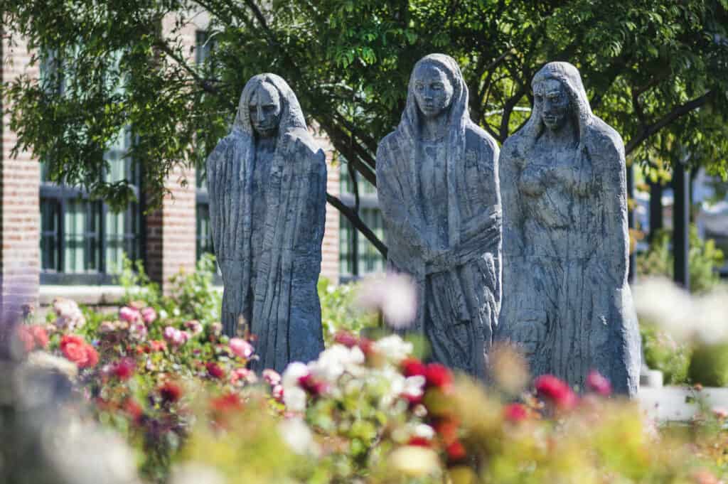 The "Three Sisters" statue on Chico State's campus, comprised of three women standing nine and a half feet tall cast in concrete