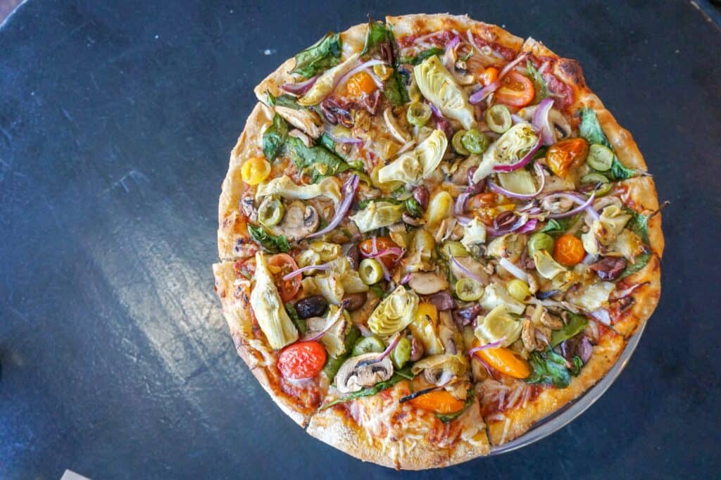Overhead view of a vegetarian pizza from Farm Star Pizza