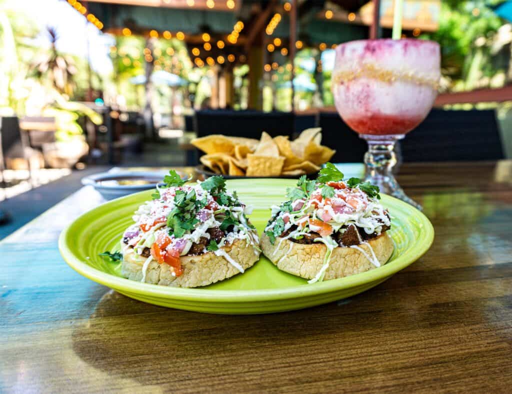 Tostadas and a margarita on the Tres Hombres patio