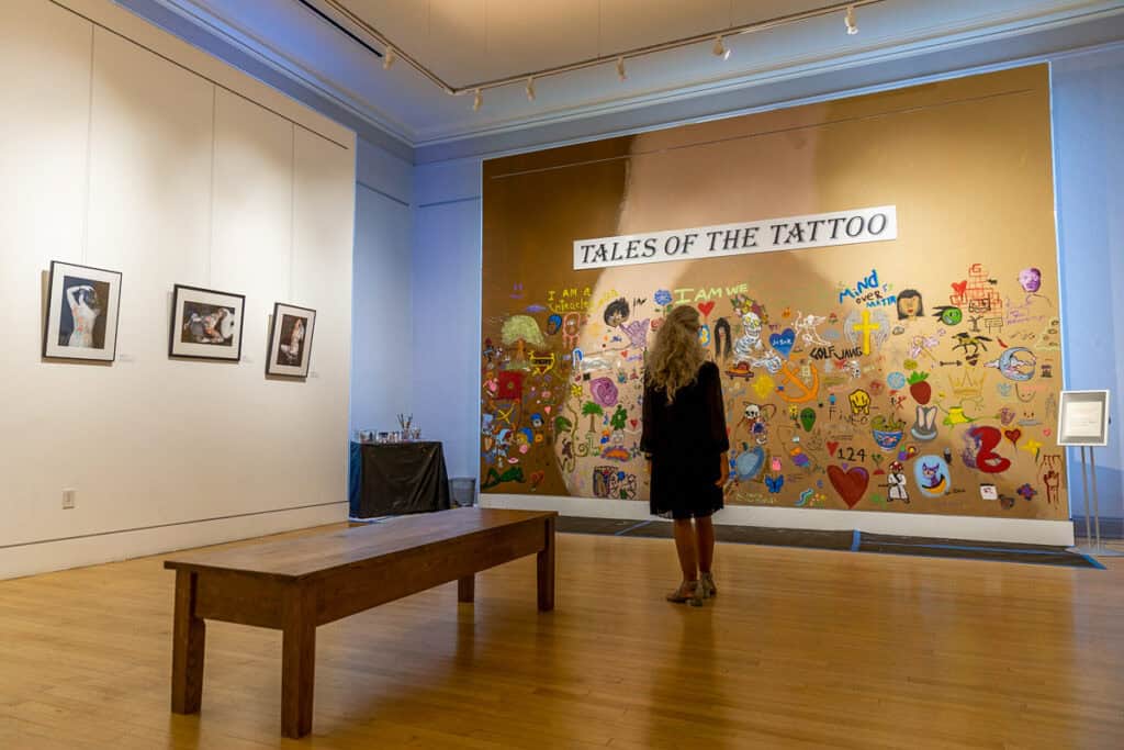 A woman enjoying the arts and culture at the Museum of Northern California Art (mona)