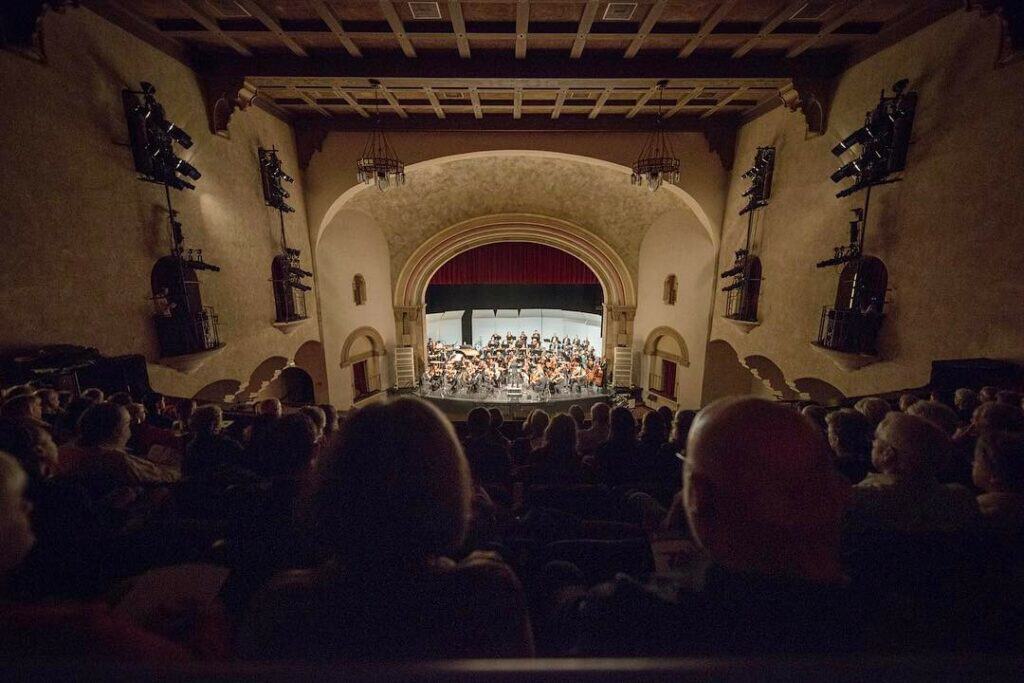 People watching a performance at Laxson Auditorium